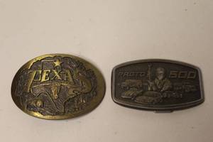 lot 201 image: Texas State Heritage Attitude Buckle & vintage brass Proto 500 professional mechanics commemorative belt buckle