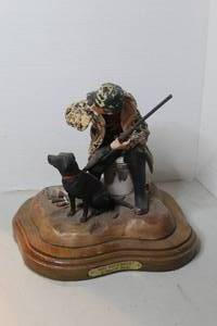 lot 222 image: duck hunter with black Labrador figurine artwork titled MID NOVEMBER by the artist Edward L. Hankey also numbered (Limited edition 28150)