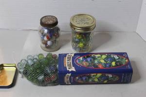 lot 250 image: collection of vintage glass marbles packaged in two Ball mason jars and a mesh bag