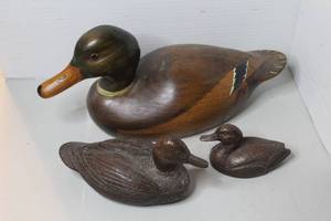 lot 259 image: These are hand-carved and painted wooden duck decoys often used for folk art decor