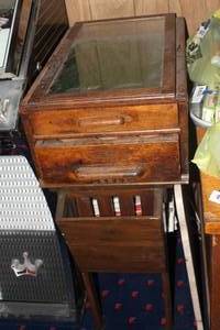 lot 263 image: rare antique McCaskey Account Register, featuring a top glass-topped display area and three pull-out drawers for organizing records.