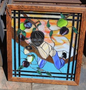 lot 281 image: unique piece of stained glass art showing a boy in a tree about 26x24