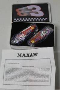 lot 327 image: a Maxam NASCAR Dale Earnhardt Sr. #3 and Dale Earnhardt Jr. #8 collector knife set in a tin.