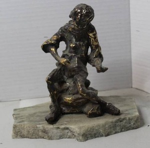 lot 330 image: expressionist bronze sculpture of a figure, mounted on a light-colored, rough stone base needs to be reglued to base