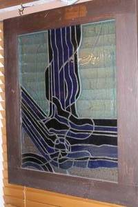 lot 373 image: handcrafted stained glass window panel featuring an abstract about 26x31