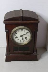 lot 382 image: vintage Seth Thomas mantel clock with a dark wooden cabinet