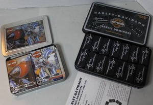 lot 388 image: Harley-Davidson 2003 Classic Double Six Dominoes set in a black metal tin & Harley-Davidson 2003 two-deck playing card set in a collectible tin