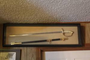 lot 404 image: vintage U.S. Navy Officers sword with a scabbard in a shadow box