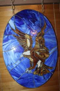 lot 411 image: stained glass-style hanging panel depicting a bald eagle soaring against a blue sky about 25x18