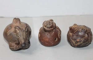 lot 435 image: hand-molded ceramic whistles