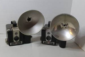 lot 472 image: 2-vintage Kodak Brownie Hawkeye cameras with flash attachments