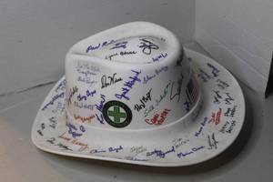 lot 479 image: white autographed safety cowboy hat featuring signatures from various individuals and a U.S. Army Corps of Engineers logo