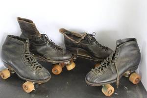 lot 495 image: vintage black leather roller skates one set has wood Wheels