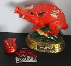 lot 498 image: vintage 1969 Ezra Brooks Arkansas Razorbacks red boar ceramic whiskey decanter & patches featuring the team logo &  more see pictures for details