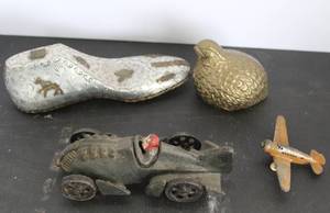 lot 501 image: A mix theres cast iron toy cars & vintage Barclay U.S. Army diecast metal airplane toy & vintage brass quail figurine and more see pictures for details