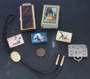 lot 503 image: vintage gold-toned lighter with cigarette holder & vintage Camel cigarette advertising matchbooks featuring pin-up artwork & vintage bronze John F. Kennedy commemorative token & more see pictures