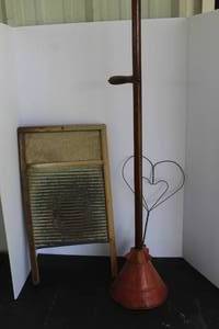 lot 560 image: vintage wood and metal washboard and antique manual laundry washer and vintage rustic double heart wire area rug beater with a wooden handle