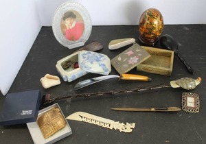 lot 570 image: variety of personal grooming tools and decorative like vintage Royal Satsuma hand-painted porcelain egg & vintage hand-carved Egyptian camel letter opener & eagle handled back scratcher and more see pictures for details