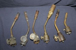 lot 31 image: Several sizes of brass, propane torch tips