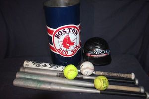 lot 62 image: Baseball bats, Balls, trashcan and batting helment