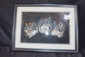 lot 26 image: Handcrafted Cross stitch artwork featuring three wolves