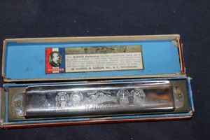 lot 90 image: Vintage harmonica