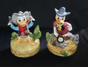 lot 23 image: Vintage Disney Donald Duck ceramic music boxes produced by schmid