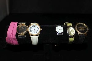 lot 145 image: Five watches and extra band