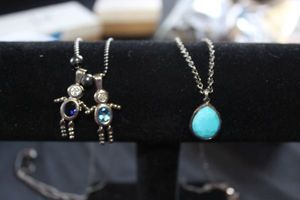 lot 116 image: Two Sterling Silver Necklaces with Pendants
