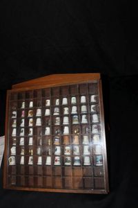 lot 152 image: Display shelf with contents