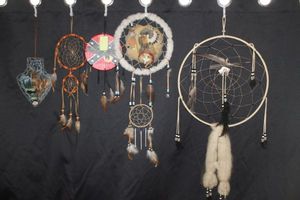 lot 16 image: Various sizes and styles of dream catchers