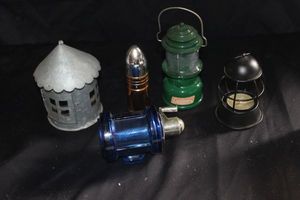 lot 195 image: Avon Decanters a n d decorative candle holders