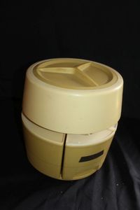 lot 235 image: Tupperware lazy Susan canister set