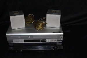 lot 280 image: Sylvania DVDVHS Combo Player and Dynex stereo reciever with multi media receiver with Speakers