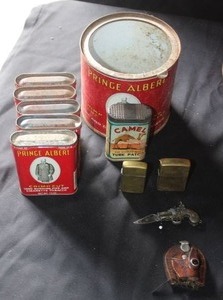 lot 298 image: 2 vintage Zippo lighters, tobacco tins, gun knife with holster