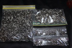 lot 321 image: Bags of hook rings