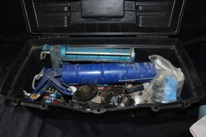 lot 330 image: tool box full, caulking guns, hardware, tools