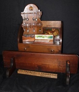 lot 340 image: Wood wall shelf, ruler box, collectible spoon set with display plus