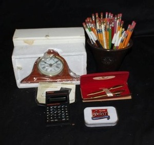 lot 354 image: Desk top supplies, mantle clock, penspencil holder, Centennial pen set plus