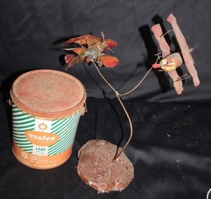 lot 365 image: Antique Azalea Lard tin can and vintage airplane art