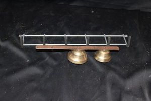 lot 399 image: Brass bells & utility hanger