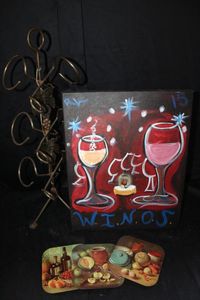 lot 403 image: Wine bottle holder and wine themed art