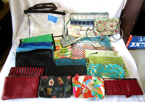 lot 79 image: Assorted clutch purses and hand bags as shown, generous quantity