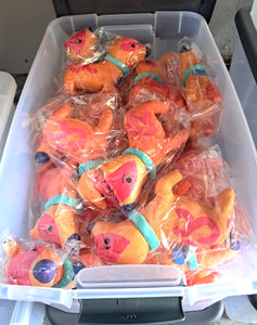 lot 85 image: NIB plastic tote full of plushy toy dogs each in unopened pack (Tote with lid included)