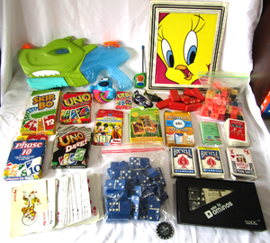 lot 127 image: Assorted card games plus, dominoes, UNO, and more as shown