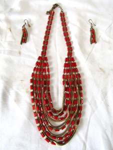 lot 130 image: Thalia Sodi Gold-Tone Baguette Multi-Row Necklace with matching earrings