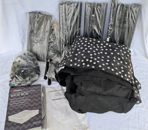 lot 118 image: Portable polka dot curtain storage closet (Like new Never assembled) and Home basics 12-pair under bed shoe storage box