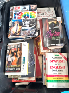 lot 104 image: Plastic tote full of assorted books