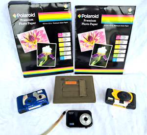 lot 159 image: Polaroid premium photo paper, Vivitar digital camera, disposable cameras,