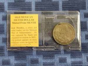 lot 17 image: 1958 Old Mexican Silver Dollar